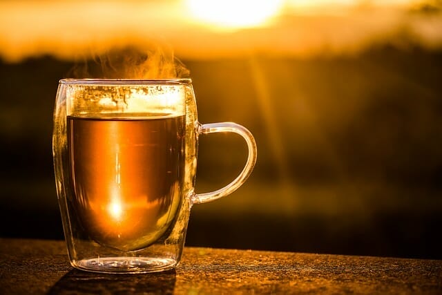 A glass of herbal infusion